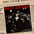 Newspaper with a cover featuring a black and white photo of a party scene and the text 'Roxette Look Sharp!'