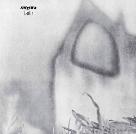 Album cover with a heart shape and text 'faith' on a blurred background