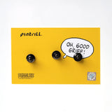 Pair of earrings with 'Oh, Good Grief!' speech bubble on a yellow background with Pintrill branding.