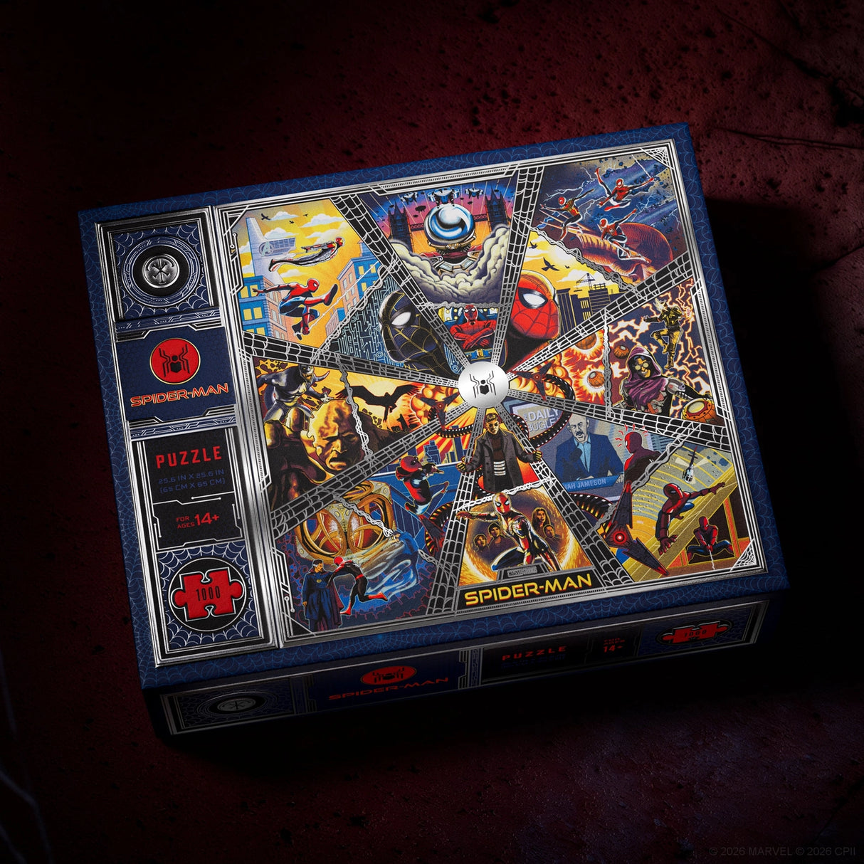 Marvel Spider-Man themed jigsaw puzzle box shown at an angle on a dark textured background. The box features a highly detailed, colorful collage of Spider-Man and other Marvel characters on the front, with 'SPIDER-MAN PUZZLE' and Marvel branding visible.