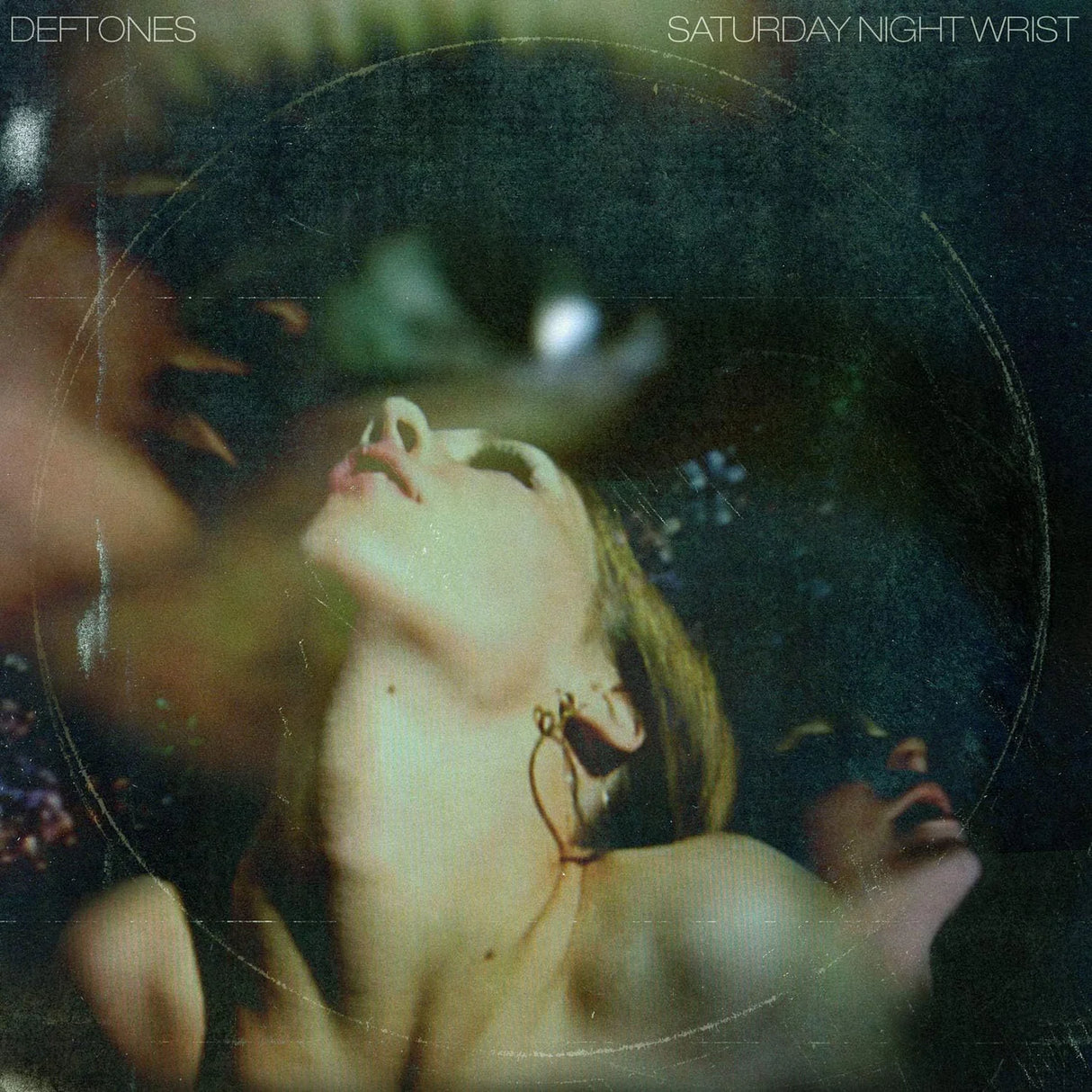 Album cover for 'Saturday Night Wrist' by Deftones featuring a person with a butterfly on their neck.