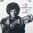 Album cover featuring a person holding a guitar with text in Portuguese