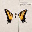 Album cover with two yellow butterflies on a beige background, featuring the text 'brand new eyes' and 'paramore'.