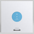 A vinyl record partially pulled from a white outer sleeve, showing a light blue center label with the text 'SULLY FLOCK' and a black Astronomica logo printed near the bottom of the sleeve.