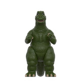 Green dinosaur-like toy figure on a white background