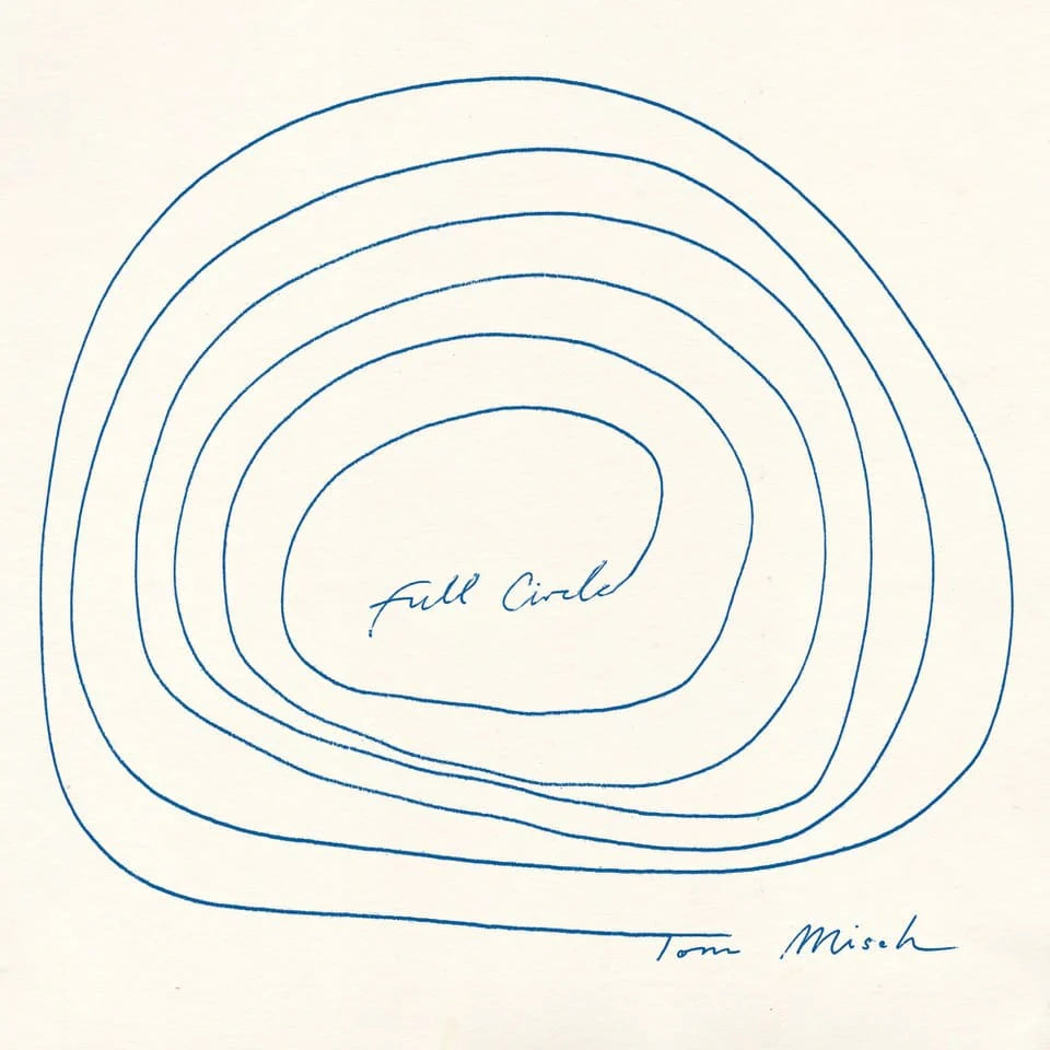 Blue concentric circles on a white background with 'Full Circle' text