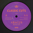 Purple record label for 'ABACUS Relics EP' by Classic Cuts on a black background
