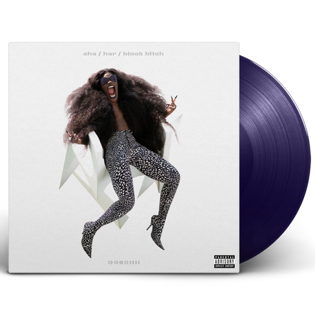 Vinyl record with a stylized cover featuring a person and the title 'she/her/black bitch'.