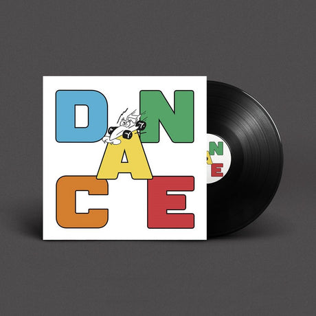 Vinyl record with a colorful 'DANCE' cover on a gray background