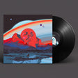 Vinyl record with a colorful album cover featuring a celestial design.