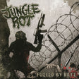 Album cover with text 'Jungle Boy' and 'Fueled by Hate', featuring a person holding a rifle against a barbed wire fence.