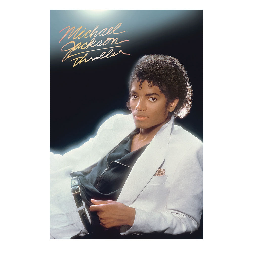 A Michael Jackson Thriller poster featuring a portrait of the artist in a white blazer and dark shirt, with his signature in gold at the top against a dark background.