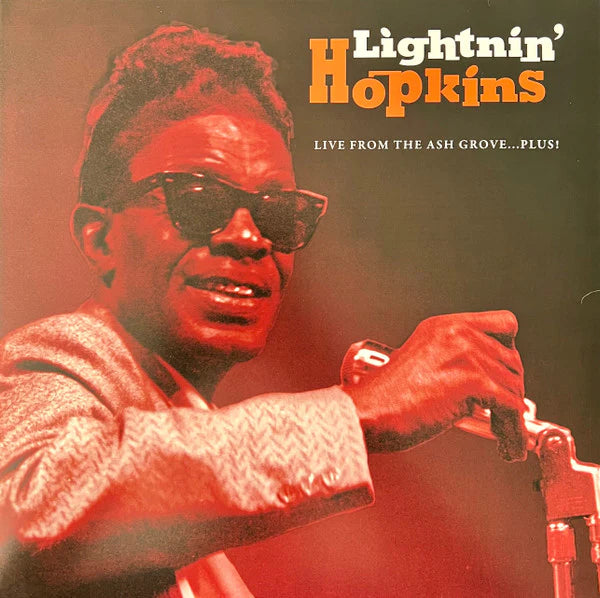 Album cover featuring a musician with sunglasses and text 'Lightnin' Hopkins Live from the Ash Grove Plus'.