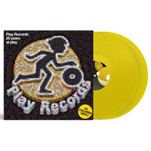 Vinyl record with colorful packaging featuring a silhouette of a person playing drums.