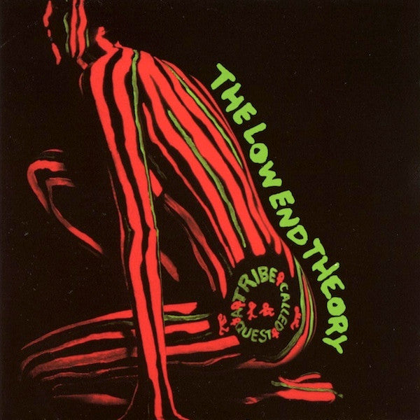 This image features the cover art for the CD titled "A Tribe Called Quest – The Low End Theory." The artwork is striking with its vibrant, neon colors, predominantly in red and green, highlighting a stylized graphic of a figure in a crouched position against a dark background.