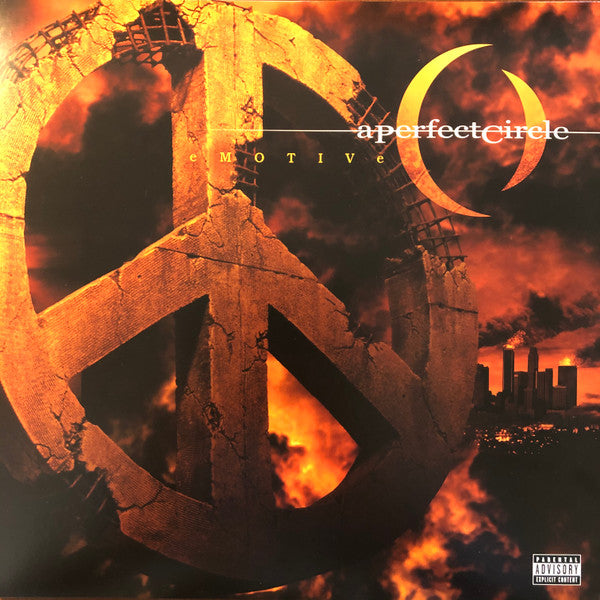 Album cover for A Perfect Circle's 'Emotive' with a peace symbol and cityscape.