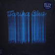 Blue vinyl record with 'Tarka Blue' text and a blue label on a black background