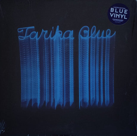 Blue vinyl record with 'Tarka Blue' text and a blue label on a black background