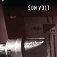 Close-up of a microphone with 'Son Volt' and 'Trace' text on a dark background