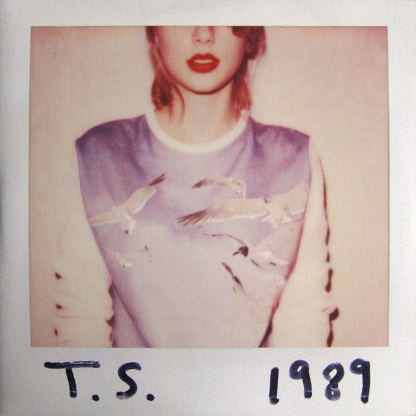Taylor Swift album 1989 with a stylized photo of Taylor Swift on the cover, with birds flying in the background, and the album title and year '1989' displayed.