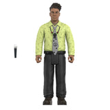 Action figure in a bright yellow shirt with a tie and black pants on a white background