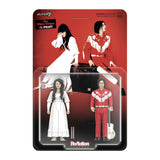 Action figure packaging with two characters on a red background, featuring Super7 branding.