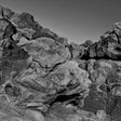 Close-up of large rocks with a clear sky above