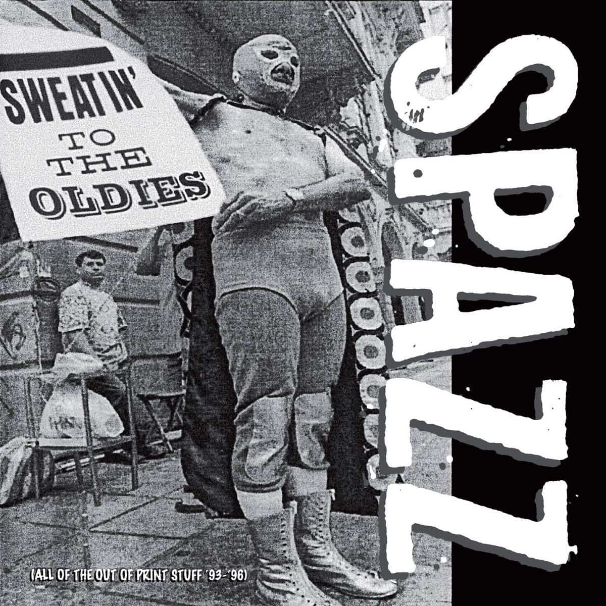 Black and white album cover with text 'Sweatin' to the Oldies' and 'Spaz' on a vintage street scene.