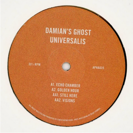 A circular orange vinyl record label with white text reading 'DAMIAN'S GHOST UNIVERSALIS' and track listing details, photographed against a plain white background.