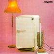 Album cover with a refrigerator and lamp against a pink background, featuring the band 'The Cure'.