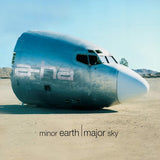 Large airplane fuselage on a desert ground with 'ethereal' branding and text 'minor earth | major sky'.