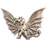 Bronze dragon figurine on a white background