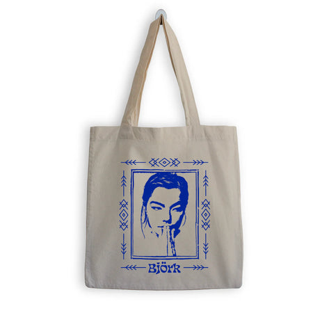Tote bag with a portrait and 'Bjärk' text on a beige background