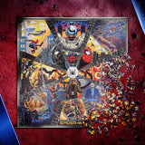 A Spider-Man themed jigsaw puzzle box shown on a textured red background, with the puzzle pieces scattered around the lower right corner. The box features a highly detailed, multi-panel comic book style illustration of Spider-Man and other Marvel characters.