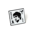 Square patch with Bruce Lee's portrait and silhouette of a martial artist on a white background