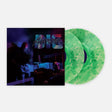 Vinyl record with green marbled design and album cover featuring a person lying down.