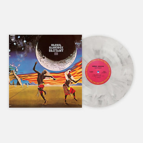 Vinyl record with cover featuring two dancers under a celestial design