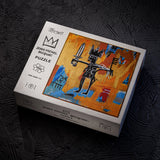 Jean-Michel Basquiat puzzle box on a textured black surface