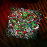 Colorful TMNT (Teenage Mutant Ninja Turtles) graphic on a textured surface