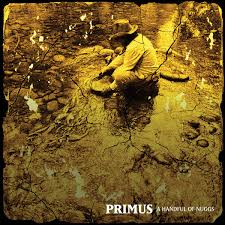 Album cover for Primus's 'A Handful of Noses' featuring a sepia-toned photograph of a person sitting by a stream, with the band name and album title at the bottom.