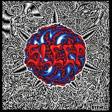 Album cover with abstract design and text in red and blue on a black and white patterned background