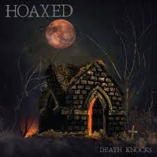 Dark stone chapel with a full moon in the background, titled 'Hoaxed' by Death Knocks.
