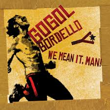 Vintage-style poster with a graphic of a man and text 'Gogol Bordello We Mean It, Man!' on a textured background.