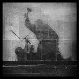 Collage of a person holding a hammer and chisel, with a grid overlay.