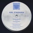 Record label for 'Mr. Fingers' with text and logo on a black background