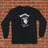 Black long-sleeve shirt with graphic design on a brick wall background