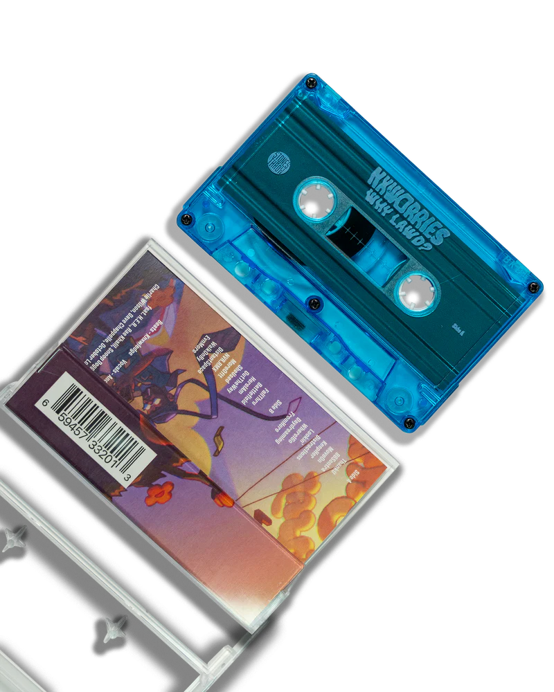 Blue cassette tape with colorful cover on a white background