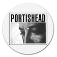 Round vinyl record with Portishead album cover featuring a black and white portrait.