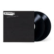 Black vinyl records with a matching sleeve on a white background