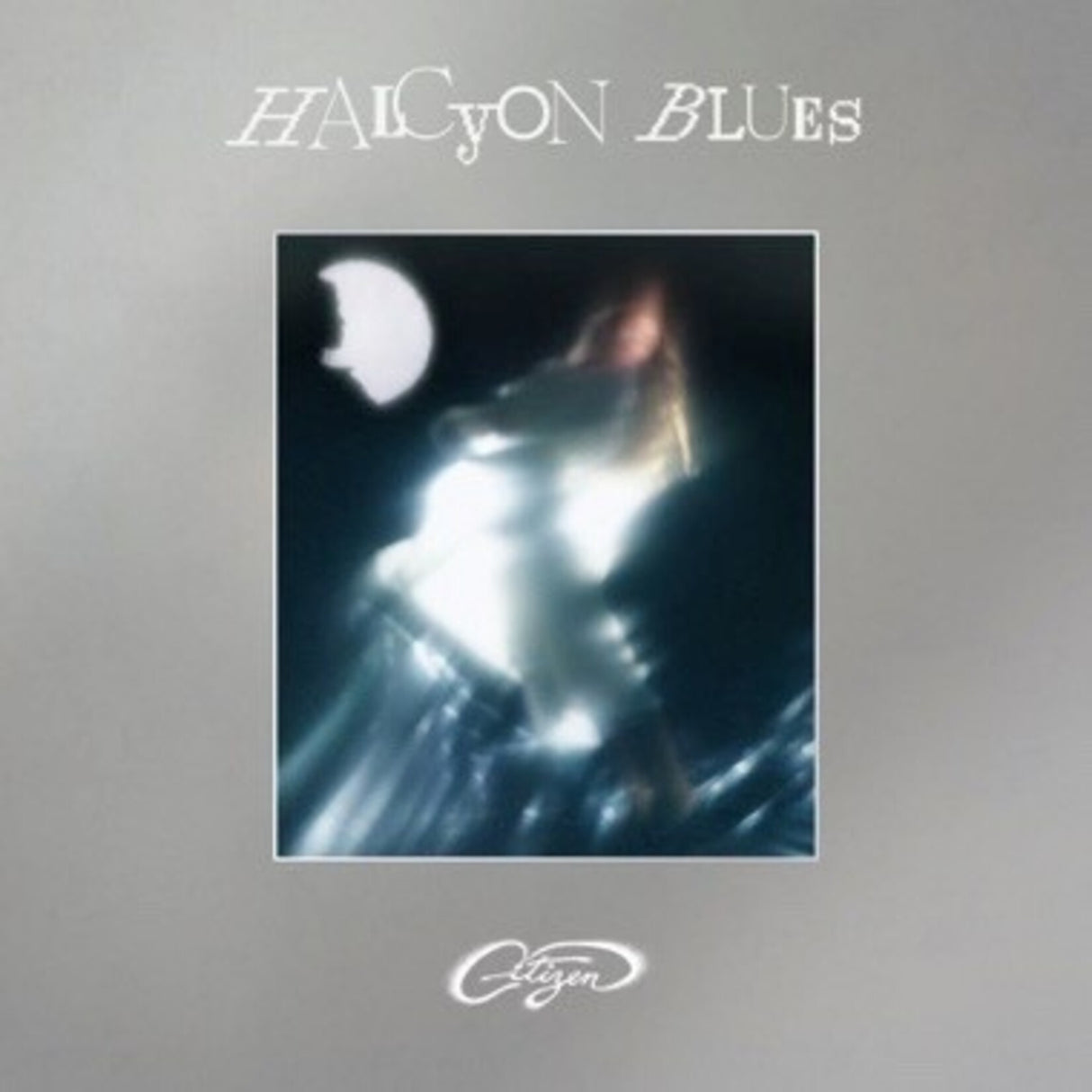 Album cover for 'Halcyon Blues' with a dark, abstract design and visible branding.